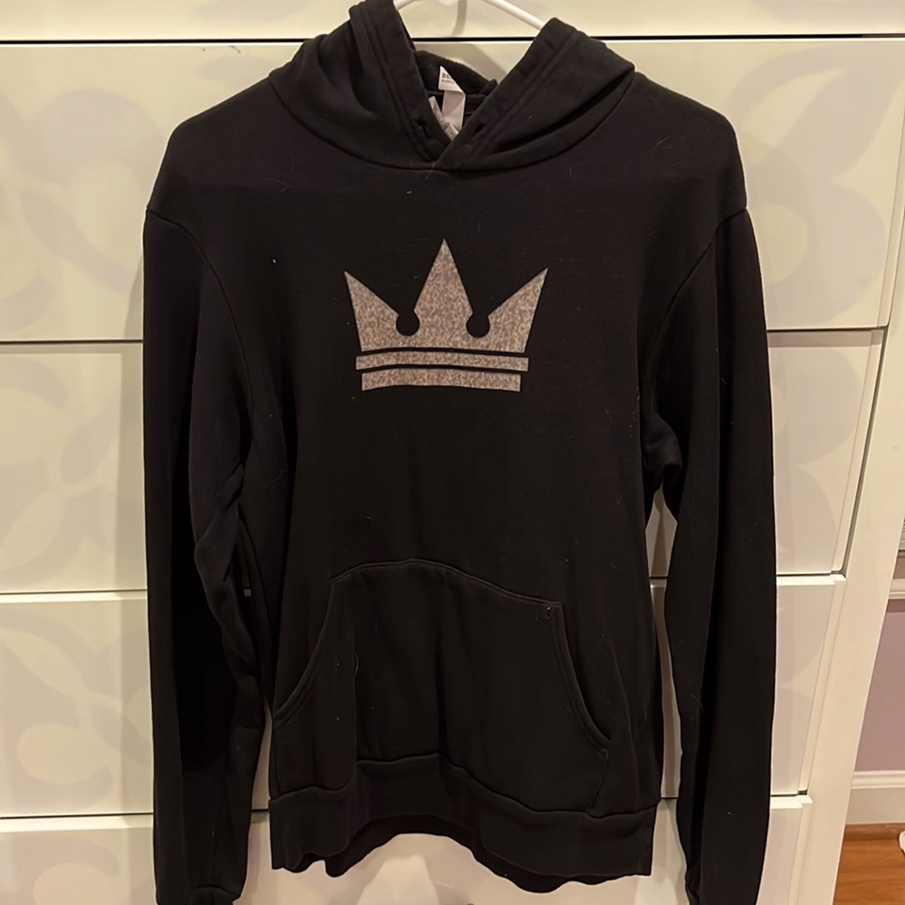 black sweatshirt with crown